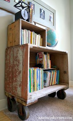 an old wooden cart with books on it