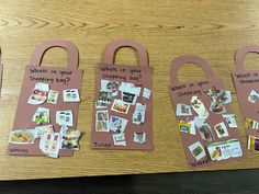 three pink paper bags with pictures and words on them