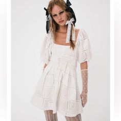 Self: 100% Cotton. Lining: 100% Cotton. Patchwork Eyelet Puff Sleeves Decorative Lace-Up Detail Invisible Zip Closure Marked Size L. Please Do Research On Sizing Before Purchasing. I Will Not Accept Returns Because Of Fit. Chic Lace Dress With Broderie Anglaise, Chic Lace Puff Sleeve Dress For Summer, Chic Puff Sleeve Mini Dress For Garden Party, Chic Mini Puff Sleeve Dress For Garden Party, Fitted Mini Dress With Broderie Anglaise For Daywear, Fitted Mini Dress With Broderie Anglaise, Fitted Broderie Anglaise Mini Dress For Daywear, Lace Puff Sleeve Dress For Brunch, Fitted Broderie Anglaise Mini Dress