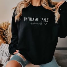 "At this time, we do not offer gift messaging, wrapping or notes, please send a separate card to your recipient if you are directly shipping a package. If you want an oversized look, we recommend sizing up 1-2 sizes. GILDAN 18000 - Unisex heavy blend crew neck sweatshirt - Pre-Shrunk 50% Cotton/50% Polyester made with softer air-jet spun yarn - Size chart can be found on listing photos - Unisex fit, runs true to size - Colors may vary slightly due to your monitor settings PRINTING TECHNIQUE -DTG or Direct-to-garment is a printing method that sprays the ink onto the garment. The ink then soaks into the fibers of the garment. It's like printing on paper, but on clothing. This technique makes the design last longer and does not \"sit on top\" of the garment. This is NOT the same as vinyl or d Long Sleeve Sweatshirt With Lettering As Gift, Inspirational Letter Print Top As Gift, Long Sleeve T-shirt With Text Print For Gift, Text Print Long Sleeve T-shirt For Gifts, Inspirational Crew Neck Top As Gift, Crew Neck Slogan Sweatshirt As Gift, Hockey Mom Shirts, Hockey Swag, Hockey Outfits