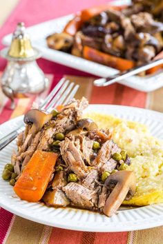 This Slow Cooker Pot Roast recipe elevates a classic comfort food dish with red wine and balsamic vinegar for rich flavor. Tender veggies, melting beef, and a thick gravy make this the absolute best crockpot roast recipe. | how to make pot roast | homemade pot roast crockpot | best pot roast recipe | crockpot pot roast recipe | pot roast slow cooker | pot roast crock pot | easy crockpot pot roast | pot roast dinner recipees | pot roast dinner ideas | crockpot dinner recipes | crockpot recipes