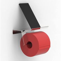 a red roll of toilet paper hanging on a wall