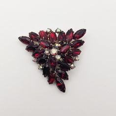 A large rhinestone brooch, with excellent construction.  Secure clasp and all stones are present and beautiful.  See pics for measurements Red Rhinestone, Rhinestone Brooches, Triangle Shape, Brooch Pin, Favorite Jewelry, Brooches, Beauty Book, Accessory Gift, Pet Supplies