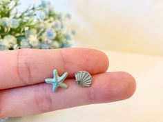 Gift for people who likes Ocean Sea! Do you have a friend who enjoys summer beach water activities? These pair of Shell and Starfish earring is perfect for her! This Beach Ocean Style Earring is also perfect to wear when you go to aquarium or sea park events. They are also wonderful gifts for people who likes Mermaid. [Clip on earrings option available  [All the photos are taken by us with real products. All rights are reserved] ♥ Details ♥ Starfish: Length: 1.2 Centimeters, Width: 1.2 Centimete Silver Starfish Earrings For Summer, Shell-shaped Earrings For Beach Season Gift, Summer Starfish Charm Earrings Gift, Crystal Seashells, Ocean Earrings, Ocean Style, Sea Jewelry, Ocean Fashion, Starfish Earrings