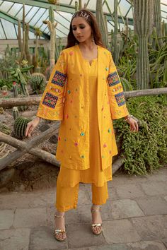 Yellow bell sleeve jacket, elevated with multi-colored flower and thread embroidery.
Component: 1
Pattern: Hand Embroidery
Type Of Work: Danka,Thread Embroidery,Floral
Neckline: Open Neck
Sleeve Type: Bell Sleeves
Fabric: Dupion Art Silk 
Color: Yellow
Other Details: 
Note: Inner kurta and pant worn by the model are not for sale
Occasion: Sangeet - Aza Fashions Open Neck, Embroidery Floral, Kurta With Pants, Thread Embroidery, Jacket For Women, Embroidered Jacket, Sleeve Jacket, Jackets Online, Aza Fashion