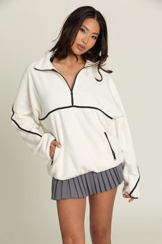 Best Selling Ivory Minimalistic Half-Zip Pullover is an absolute game changing staple you will find yourself living in! It has a trendy, minimalistic vibe with its ivory color and cream line details. It features dual side pockets, half-zip closure and a soft, fleece material that is so warm. The fit is slightly oversized too, which is amazing! Pleated Tennis Skirt, Clothing Haul, Tennis Skirts, Half Zip Sweatshirt, Half Zip Pullover, Find Yourself, Athletic Outfits, Tennis Skirt, Fit Inspo