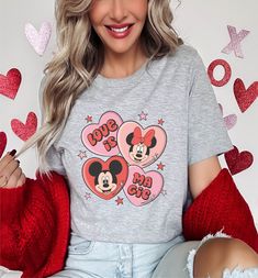 Love Is Magic Mickey &Minnie Shirt,Minnie and Mickey Valentines Shirt,Minnie and Mickey Heart,Mickey Valentines Tee,Valentines Day,V-Day Tee  Our designs are printed through the DTF (DIRECT TO FILM ) process. DTF designs are NOT able to be altered. They are printed as illustrated.  For the following color shirts the font color will automatically apply unless otherwise noted by you. Heather Muave Shirt : Black font Heather Military Green Shirt: Black Font  Heather Peach Shirt: Black Font  Sot Gre Fun Valentine's Day Tops With Graphic Print, Cute Heart Print Tops For Valentine's Day, Mickey Valentines, Love Is Magic, Military Green Shirt, Dtf Designs, Mickey Love, Mouse Pictures, Minnie And Mickey