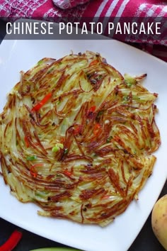 chinese potato pancake on a white plate