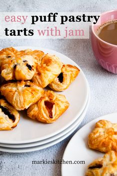 A picture of puff pastry tarts filled with jam served on a plate next to a cup of coffee. Puff Pastry Jam Recipes, Puff Pastry Jam, Jam Turnovers, Puff Pastry With Jam Recipe, Jam Puff Pastry Recipes, Jam And Puff Pastry, Jam Tarts With Puff Pastry, Puff Pastry Jam Tarts, Jam Filled Pastries