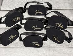 six fanny bags with name written on them