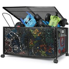 a toy storage bin filled with toys and other items on wheels, against a white background