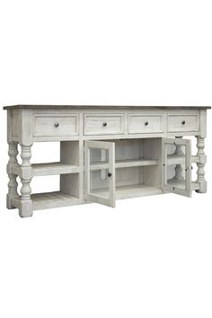 the sideboard is white and has two drawers on one end, an open shelf with three