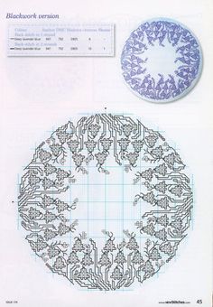 a blue and white cross - stitch pattern on a piece of paper with a circular object in the middle