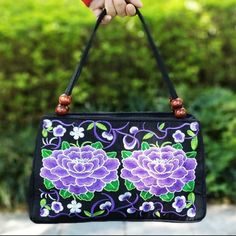 Both Sides Of Embroidered Bag Are Fully With Vibrant Flower ,It Looks Like Real Flowers And Made Of Different Color Lines, It Is Amazing And Pretty. Easy To Match Our Embroidered Handbags Looks Great With Jeans Or Dressed In Black For An Evening Out ,Let You Get More Compliments On This Beautiful And Cute Flower Handbags Bright In The Crowd Beautiful Embroidery Handbag ,The Colors Is Bright And Pretty , Let You Prominent In The Crowd, Very Fashion And Personalized ,It Can Be Used As A Embroidered Shoulder Bag. Absolutely Worth Your Collection Or As A Gift To Your Friends And Mother Light And Easy To Carry Dimension :Length :11.4 Inch, Width:3.5 Inch High:8.5 Inch. Please No Purple Embroidered Bags For Everyday Use, Embroidered Purple Shoulder Bag For Everyday Use, Purple Embroidered Everyday Bag, Embroidered Purple Shoulder Bag For Daily Use, Purple Embroidered Shoulder Bag For Daily Use, Everyday Purple Embroidered Bags, Everyday Use Purple Embroidered Bags, Purple Embroidered Rectangular Shoulder Bag, Traditional Embroidered Purple Bag