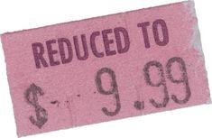 a pink sign that says reduced to $ 9 99