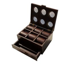 an open wooden watch box with six watches inside