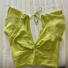 Bright Chartreuse Cropped Top, With Adorable Beaded Tie. The Fabric Is 55% Linen, 45% Cotton. This Is A Brand New Top, Worn Once In Excellent Condition. No Signs Of Wear, Tears Or Pilling. Comes From A Pet Free And Smoke Free Home! Green Tie Back Top For Vacation, Elegant V-neck Crop Top For Vacation, Green V-neck Crop Top For Day Out, Spring Green Tie Back Crop Top, Green Tie Back Crop Top For Spring, Chic Green Crop Top For Beach, Elegant Green Crop Top For Spring, Fitted Green Blouse For Vacation, Beaded Tie