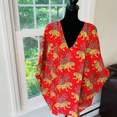 This Kaftan, Made From Incredibly Soft And Lightweight Cotton, Is Versatile For Many Occasions. Perfect For A Swimsuit Cover Up On The Beach Or By The Pool, With Shorts And A Tank Top Or Over A Summer Dress. Can Be Also Worn With A Glam Belt For A More Dressed Up Look For Lunch. It Compliments All Body Types With Its Long, Hangs Loose Design. It Can Be Worn In Many Different Stylish Ways To Make You Look Your Best! The Cotton Tie Accent At The Waist Makes It Easy For You To Wear. Kaftan Item Det Casual Red V-neck Kaftan, Casual Red Printed Kaftan, Red V-neck Kaftan For The Beach, Casual Red Tunic For Vacation, Red Flowy V-neck Kaftan, Red V-neck Beachwear Dress, Red V-neck Tunic For Vacation, Red Casual Summer Kaftan, Casual Red Summer Kaftan