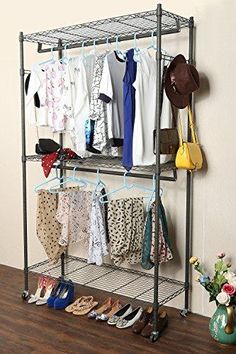 an iron rack with shoes and hats on it