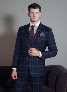 Elevate your next formal endeavor with our Loro Piana Mentel Wool Silk Linen Jacket, which adds depth and sophistication to any look. Crafted from a blend of wool, silk, and linen fabrics, this jacket provides a beautiful drape from the wool, a textured feel from the linen, and a soft sheen from the silk. The classic plaid weave in a dynamic shade of blue adds a bold and striking touch to any modern outfit, making it a versatile wardrobe staple that will stand the test of time. Whether you're at Elegant Wool Tweed Jacket For Business Casual, Elegant Wool Tweed Jacket With Welt Pockets, Luxury Fitted Tweed Jacket With Welt Pockets, Tailored Tweed Jacket For Semi-formal Occasions, Luxury Fitted Single Breasted Tweed Jacket, Luxury Fitted Tweed Jacket For Business Casual, Elegant Tweed Jacket For Business, Elegant Business Tweed Jacket, Luxury Fitted Single-breasted Tweed Jacket