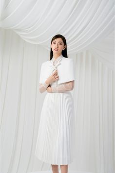 Alula Cape Top MEAN BLVD White Pleated Skirt Outfit Ideas, White Pleated Skirt Outfit, Pleated Skirt Outfit Ideas, Cape Top, Pleated Skirt Outfit, Cape Tops, White Pleated Skirt, White Kicks, Mean Blvd