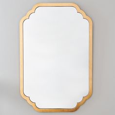 a mirror that is hanging on the wall