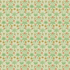 a green and orange flower pattern on a white background, with small flowers in the center