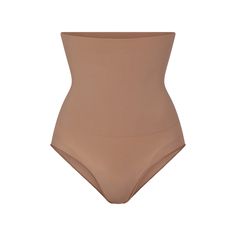 This high-waisted shapewear brief perfectly tones your core and tightens your tummy for a sculpted look while enhancing the natural shape of your butt. Featuring our highest support level and removable adjustable straps, this silky brief is perfect to wear under your favorite outfits for contoured curves and a boost of confidence. Above The Knee Shorts, High Waisted Briefs, Shapewear Bodysuit, Bow Detail Dress, Fitted Skirt, Polo Dress, Tweed Jacket, Shapewear, Womens Makeup