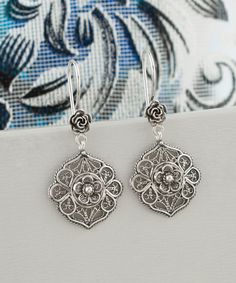 Handmade Silver Filigree Daisy Flower Drop Earrings, 925 Sterling Silver Floral Women Dangle Earrings, Vintage Delicate Ornate Earrings Silver gift for mom, best gift for her, anniversary gift her, handcrafted earrings, tiny dangle earrings Earrings' Length : 4.5 ( 1.8 in )   Width : 2cm ( 0.8 in ) These handmade silver filigree Art Floral Dangle Earrings, 925 Sterling Silver Daisy Flower Women Drop Earrings are a stunning piece of jewelry for the contemporary woman. These delicate and elegant v Intricate Flower-shaped Earrings For Gift, Elegant Filigree Flower Drop Earrings, Elegant Silver Filigree Flower Earrings, Traditional Sterling Silver Earrings In Flower Shape, Traditional Sterling Silver Flower Shaped Earrings, Traditional Sterling Silver Flower-shaped Earrings, Classic Silver Flower Earrings For Gift, Bohemian Silver Flower Shaped Earrings, Bohemian Silver Flower-shaped Earrings