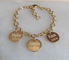 Personalized Charm Bracelet, Gold Engraved Bracelet, Mothers Day Gift, Mother of the Bride Gift, Best Friend Gift, Keepsake Bracelet, Gift ❤️This classic keepsake gold bracelet features a fancy and unique chain of polished oval rings and textured round rings (ovals measure 5.7mm, rounds measure 6mm). This is a beautiful quality made 24kt gold overlay chain that is double sided. I have adorned this fabulous bracelet with up to ten engraved 1/2 inch 14kt gold filled discs. The price varies based o Adjustable Jewelry With Engraving Option For Birthday Gift, Engraved Charm Bracelet For Mother's Day Personalized Gift, Personalized Gold Stamped Name Bracelet, Personalized Stamped Gold Name Bracelet, Personalized Engraved Nameplate Charm Bracelet, Spiritual Engraved Name Bracelet For Gift, Spiritual Engraved Name Bracelet Gift, Gold Stamped Name Bracelet For Gift, Engraved Charm Bracelet For Birthday And Mother's Day