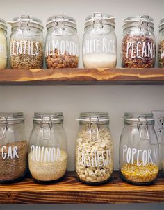 some jars that are sitting on a shelf