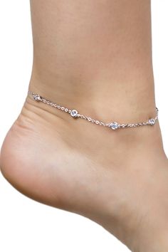 - Rhodium plated bezel CZ station anklet- Lobster clasp- Approx. 9" length with 1.25" extension- Imported Wipe clean with soft cloth Rhodium plated brass, cubic zirconia Kenneth Jay Lane, Rhodium Plated, Anklets, Lobster Clasp, Diamond Bracelet, Nordstrom Rack, Cleaning Wipes, Jay, Diamond Necklace