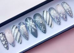 Silver Glitter, Grey and light Pink Handpainted False nails set on long stiletto shape. * Available in any shape & length. * Available in set of 10 nails and full set of 20 nails. All nail sets are handpainted, made with high quality salon products and genuine crystals. Some of nail sets have handpainted drawings. * Each order set includes nail prepare kit - mini nail file , storage gift box with a ribbon, 12 adhesive tabs. If you have any questions feel free to send me a message. ^^ Disclai Snowflakes Nail Art, Sweater Nails Christmas, Frost Nails, Gray Winter Nails, Gray Christmas Nails, Glitter Snowflake Nails, Christmas Nail Set, Snowflake Nails Silver Glitter, Dark Christmas Nails