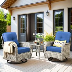 two chairs and a table on a deck