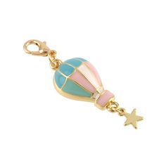 a key chain with a hot air balloon and star charms on the end of it