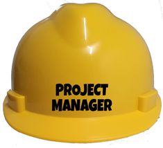 a yellow hard hat with the words project manager written on it's front side