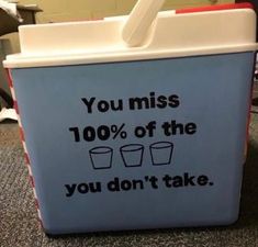 an ice chest that says you miss 100 % off the you don't take