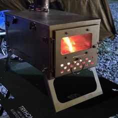 a stove that is sitting on top of a table