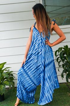 "Step into the world of boho chic with our stunning handmade jumpsuit. Crafted from soft and breathable 100% rayon fabric, this jumpsuit is designed for comfort and style. The adjustable tie shoulders allow for a customizable fit, while the wide legs create a flowy and relaxed silhouette. Measuring 45 inches when tied at the shortest and 50 inches at longest length, this jumpsuit is perfect for any occasion. Whether you're heading to a summer festival or simply lounging around, this jumpsuit is Harem Dress, Jumpsuits Summer, Indigo Pattern, Tie Dye Hippie, Hippie Stil, Boho Jumpsuit, Hippie Dress, Womens Jumpsuits, Indigo Shibori