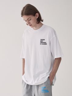 Editor's NotesPAPERBOY's classic T-shirt is made from a soft cotton jersey that has a just-right thickness for all seasons. Features simple graphic print at the chest and cut in a semi-oversized silhouette.- Ribbed crew neck- Lettering print at chest- Drop shoulder- Half sleeves- Semi-oversized silhouette- Soft hand-feel- Minimized distortion and shrinkageMeasurements(in.)S/ M/ L/ XL- Shoulder: 20.1 in. / 20.9 in. / 21.5 in. / 22.0 in.- Chest: 20.9 in. / 21.7 in. / 22.4 in. / 23.2 in.- Sleeve Length: 8.7 in. / 9.1 in / 9.4 in. / 9.8 in.- Total Length: 26.4 in. / 27.6 in. / 28.7 in. / 29.9 in.Model info:- Man: 6' 0.4, 132.3 lbs/ Fitting size XL- Woman: 5' 8.1, 108.0 lbs/ Fitting size MSize RecommendS: Height 4' 11.1 ~ 5' 5.0 / Weight 88.2 ~ 121.3 lbsM: Height 5' 3.0 ~ 5' 6.9 / Weight 110.2 Paper Boy, Simple Graphic, Oversized Silhouette, Soft Hands, Half Sleeves, All Seasons, White Undershirt, Classic T Shirts, Sleeve Length