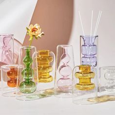 The outer layer of the glass vase is designed with transparent glass, and the interior is designed with different colors. The two colors make the vase full of fashion, personality, and cute style. Add a flower or a cutting to these cutie vases! Colored Glass Vases, Gubahan Bunga, Kristiansand, Transparent Flowers, Clear Glass Vases, Flower Holder, Stavanger, Functional Decor, Boho Dekor