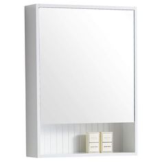 a white bathroom medicine cabinet with two small boxes on the bottom and one large mirror above it