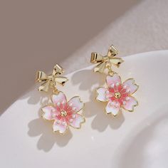 Pretty Sakura Earrings PN5119 ●Material: Alloy ●Size:2.4*1.5cm ●About Shipping: We attach great importance to the orders of each customer and parcel delivery. 1.Processing time: 2-3 business days. 2.Shipping time: 10-15 business days to US, please allow 3-4 weeks shipping to other country.(Shipping times can be affected by variable customs clearance times or public holidays.)