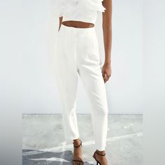 Zara High-Waisted Pants Saize Xs Color White High Waisted Pants With Pronounced Seams At Front And Back. Front Welt Pockets. Front Zip, Metal Hook, And Inside Button Closure. 7102/562 White Ankle-length Pants For Party, Spring High Waist Fitted Pantsuit, Fitted High Waist Spring Pantsuit, Chic Fitted Pantsuit With Tapered Leg, High Waist Bottoms With Fitted Waist For Spring, Chic White Tapered Leg Bottoms, Stretch High Waist Pantsuit For Spring, White Fitted Tapered Leg Pants, White High-waist Fitted Pants