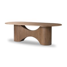 an oval wooden table with curved legs