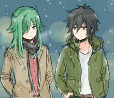 two people with green hair standing next to each other in front of snow covered ground