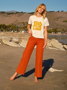 Come and get your perfect pants! Painter Pants have high-waisted silhouette with elastic in the back for comfort, a snug bottom with room for your curves, and full straight legs that are slightly cropped. Now in the orange-red color of the Golden Gate Bridge. 100% Cotton, Preshrunk Manufactured at a socially and environmentally responsible factory Inseam length is 28 for size XS, 28 1/4" for size S, 28 1/2" for size M, and 28 3/4" for size L International Orange, Painter Pants, Painters Pants, Surf Gear, The Golden Gate Bridge, Cute Pants, Perfect Pant, Hair Wear, Golden Gate Bridge