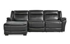 a black leather sectional sofa with recliners on the back and armrests