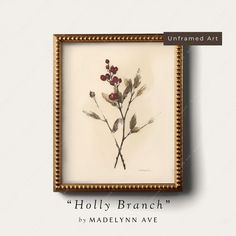 holly branch framed in gold frame on white background with text that reads holly branch? by madelyn ave