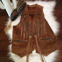 Super Cute Southwest Vibes! The Leather Ranch Suede Vest In Great Condition. A Couple Fringe Pieces Missing In Pictures (I Saw Two) The Inside Is A Satin Soft Liner. I Would Say This Fits A 16 Or Under. There Is No Actual Size Tag On This. It Has Been Removed. This Vest Is So Boho And So Country Vintage!! You Can Dress This Up Or Dress It Down! Please Message Me With And Questions Or Offers. This Is Cross Posted So Please Check With Me If It’s Still Available. Thank You Southwest Vibes, Country Vintage, Suede Vest, Vintage Country, Size Tag, I Saw, Jackets For Women, Jackets & Coats, Super Cute